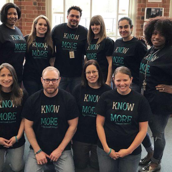 Photo of Franklin High School staff in "Know More" T-shirts