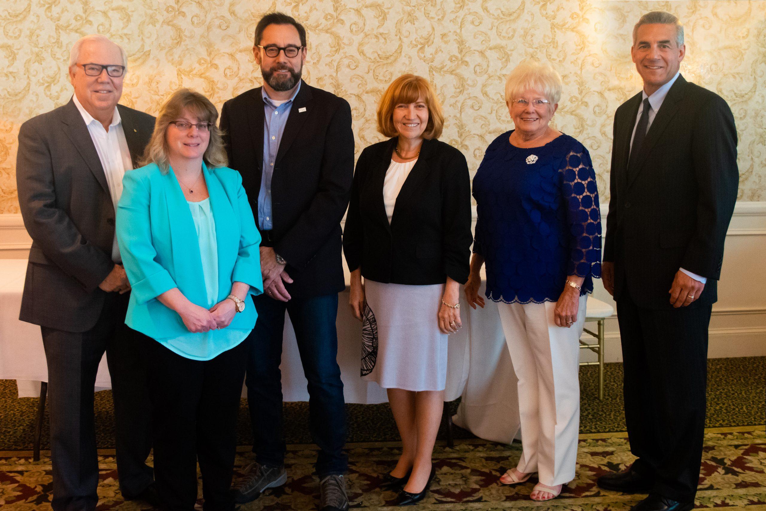 Photo staff, keynote speaker and honorees at Volunteer Appreciation event