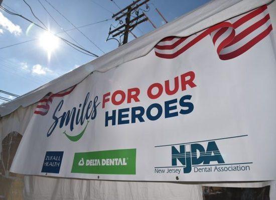Banner that says "Smiles for Our Heroes"