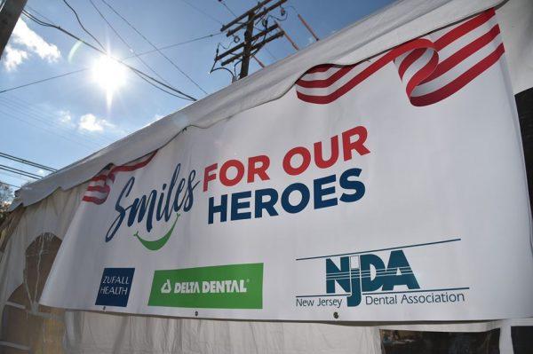 Banner that says "Smiles for Our Heroes"