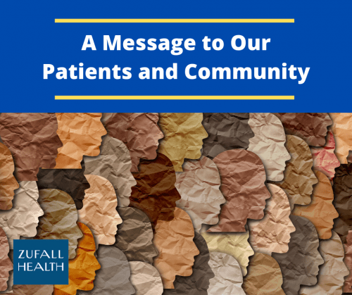 An image with the heading "A Message to Our Patients and Community". Below the heading are rows of paper cutouts of faces in profile depicting various skin tones. The image is intended to suggest diversity and community.