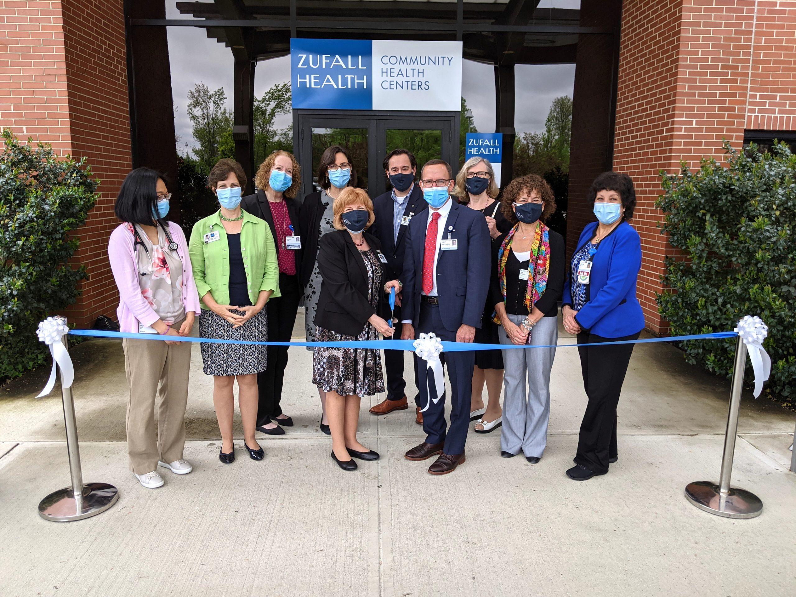 va Turbiner, CEO of Zufall Health, and James Demetriades, CEO of Penn Medicine Princeton Health, led a ribbon cutting to open Zufall Health Center – Plainsboro. Left to right: Patricia Kao, MD, Medical Director; Frances L. Palm, Chief Operating Officer, Zufall Health; Barbara Yost, Vice President, Network Development, Princeton Health; Barbara Edwards, MD, Academic Director of Ambulatory Residency Program; Turbiner; Bill Shuler, Chairman, Zufall Health Board of Directors; Demetriades; Linda Seeley, Secretary, Zufall Health Board of Directors; Rina Ramirez, MD, FACP, Chief Medical Officer, Zufall Health; and Ayda Tello, Administrative Director.