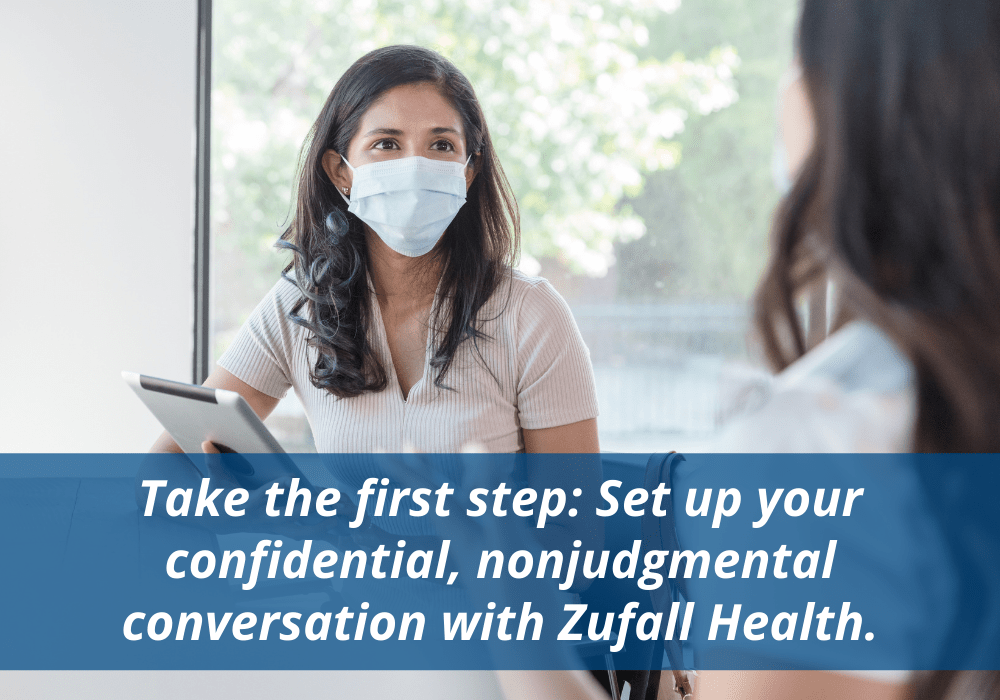 Counselor with mask holding tablet. Text says "Take the first step: Set up your confidential, nonjudgmental conversation with Zufall Health.
